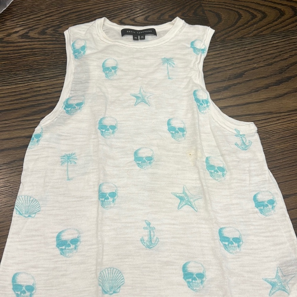 Skull cashemere tank. Worn once. Food stain but can be removed with one wash.